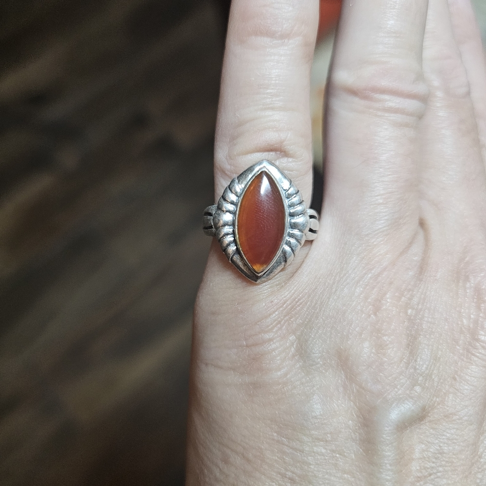 Vintage 925 sterling ring with amber colored stone.
